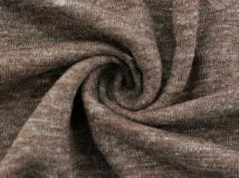 Perché il tessuto melangiato di lino è la scelta perfetta per un abbigliamento confortevole ed elegante